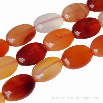 Orange carnelian oval-shaped semi precious agate gemstone beads strand, polished finish